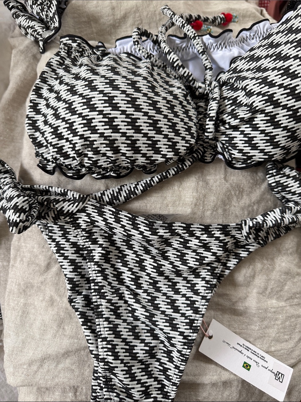 Black & White Textured Tie-Side Bikini Set - Women's Swim with shoulder cuff